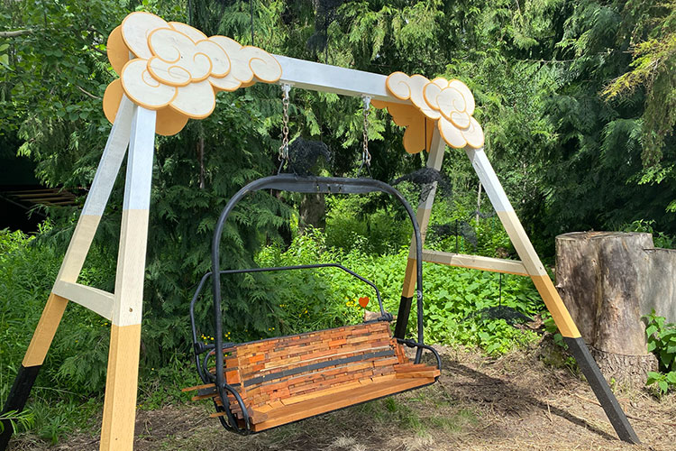 An old Catskinner chair lift from Whistler Blackcomb given a revamp by a local artist.