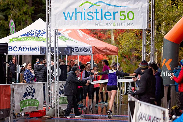 Runners crossing the line at the Whistler 50 Relay and Ultra.