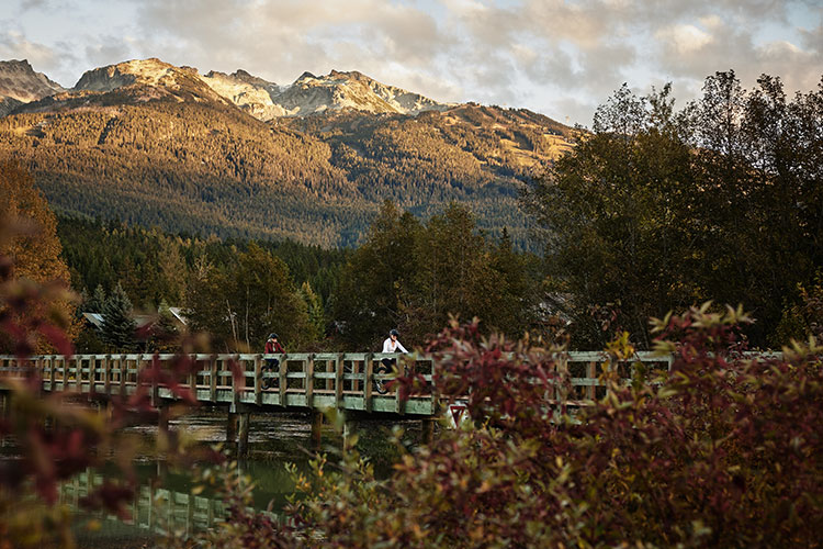 Bikers explore the Whistler Valley Trail in the fall. 