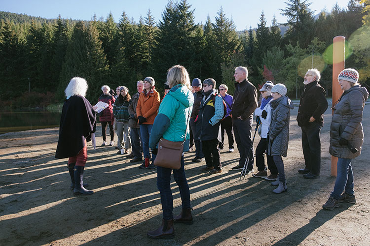 A group of writers and readers gather at Lost Lake for a Whistler Writers Festival event.