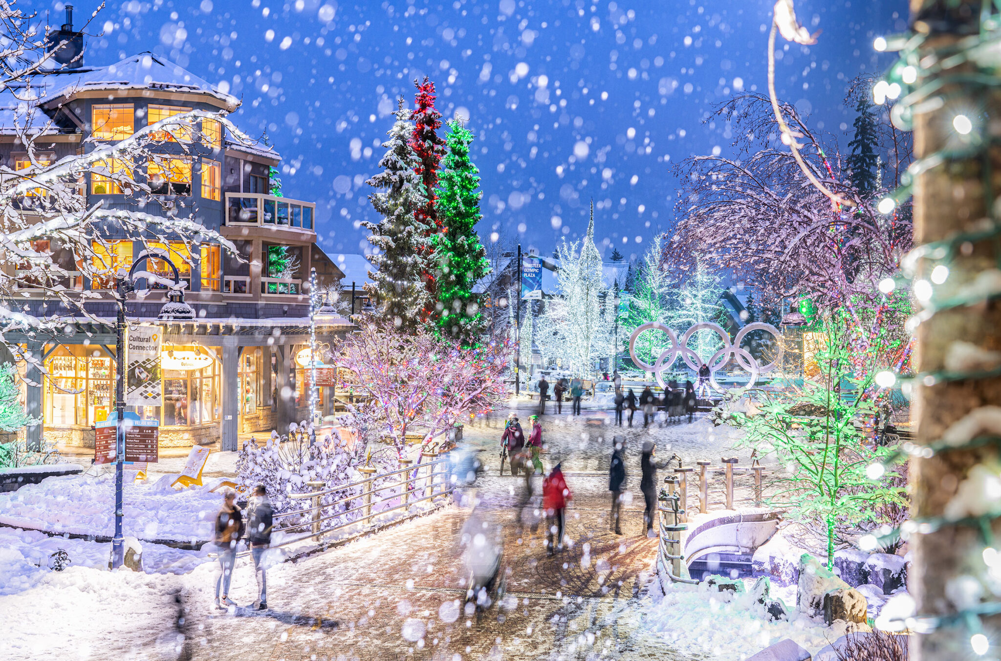 The Whistler Village Stroll lit up with festive lights.