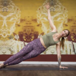 Emily Kane of Yogacara Whistler demonstrates a side plank.