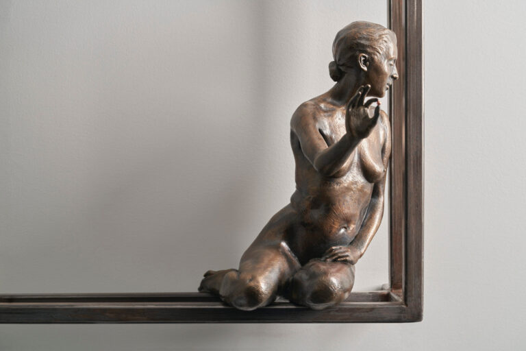 Feral Nifty's bronze sculpture Held.