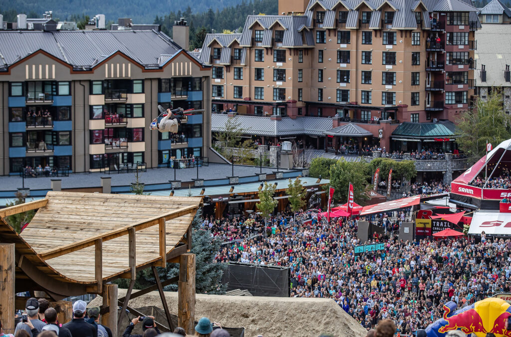 A mountain biker hits a jump during the Red Bull Joyride event, part of Crankworx on Whistler Mountain.