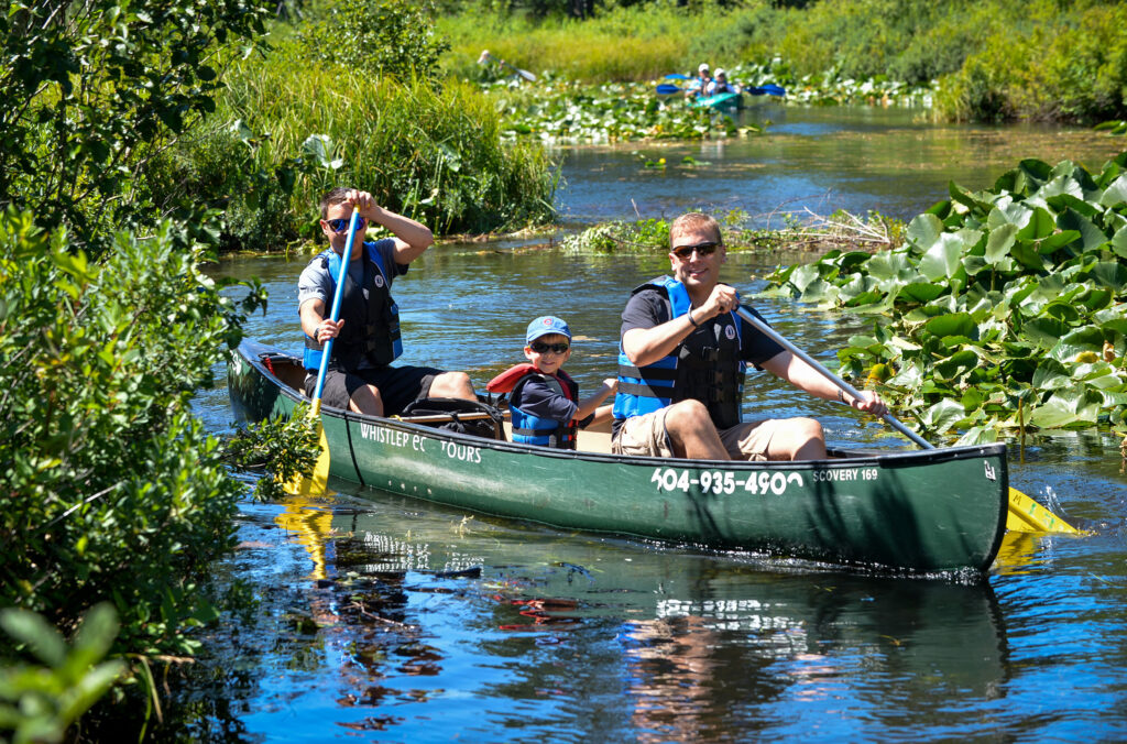 A family canoe the River of Golden Dreams with Whistler Eco Tours in Whistler.