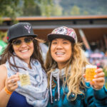 Two beer lovers says cheers at the Whistler Village Beer Festival.