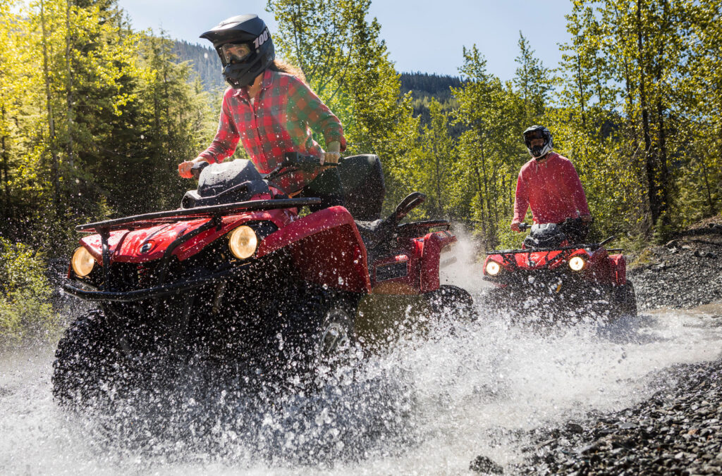 ATVs splash through the fall puddles in Whistler's wilderness.