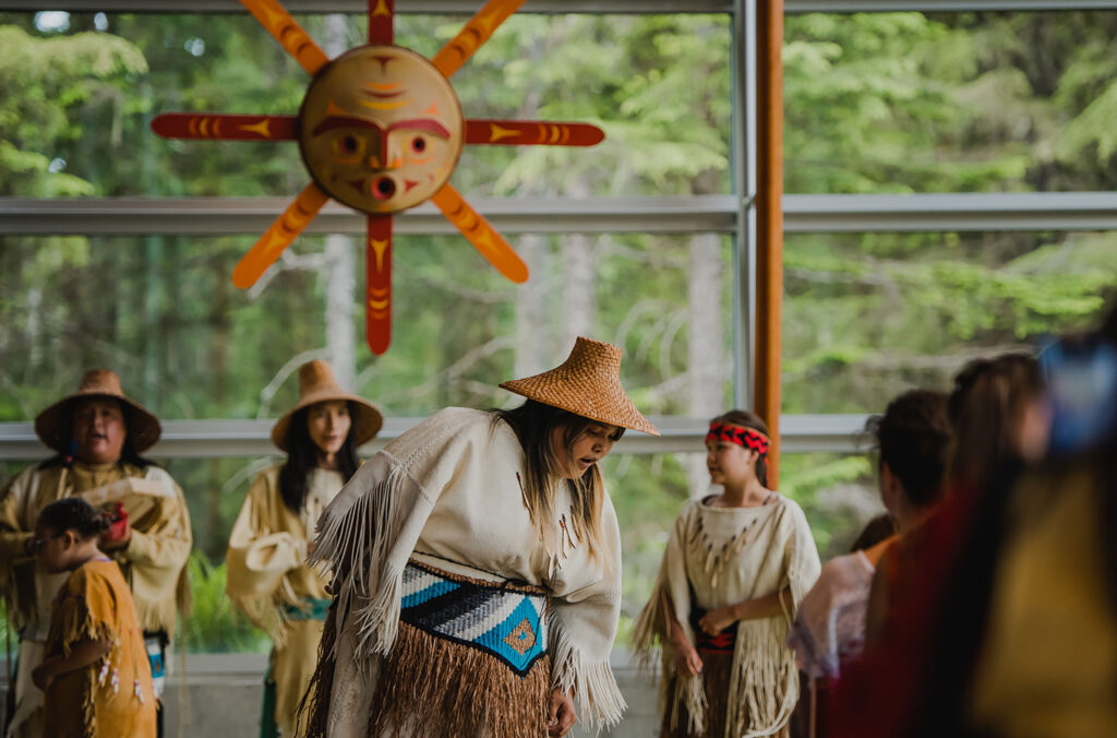 Cultural Ambassadors at the SLCC perform their hand drum, welcome dance.