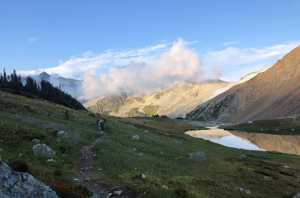 Russet Lake with mountain views in the background.