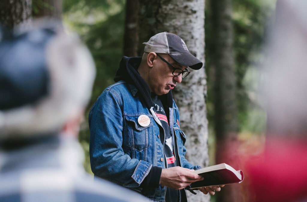 A poet reads aloud at Lost Lake at the Whistler Writers Festival.