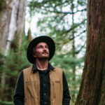 Ross Reid explores a forest in Whistler.