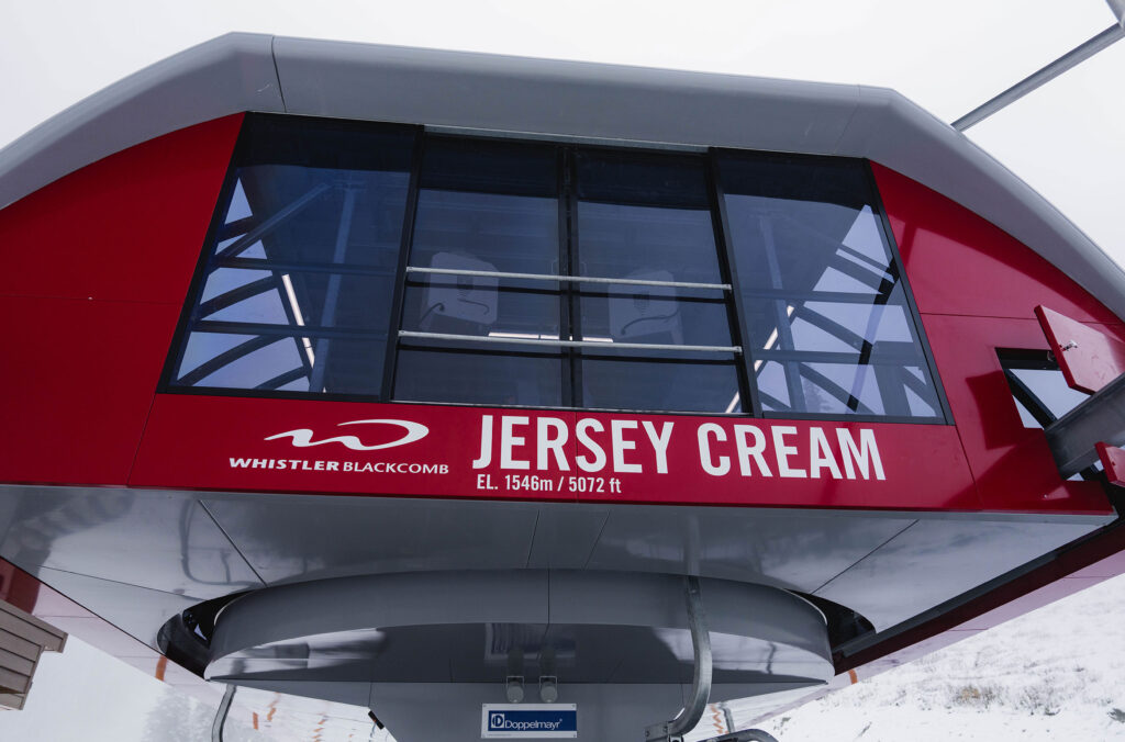 The top front of the bright red Jersey Cream Express chair.