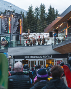 Cultural Ambassadors from the SLCC welcome skiers to the slopes on Whistler Blackcomb's opening day.