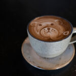 A decadent hot chocolate with bear art in the froth from Fix Cafe in Whistler.
