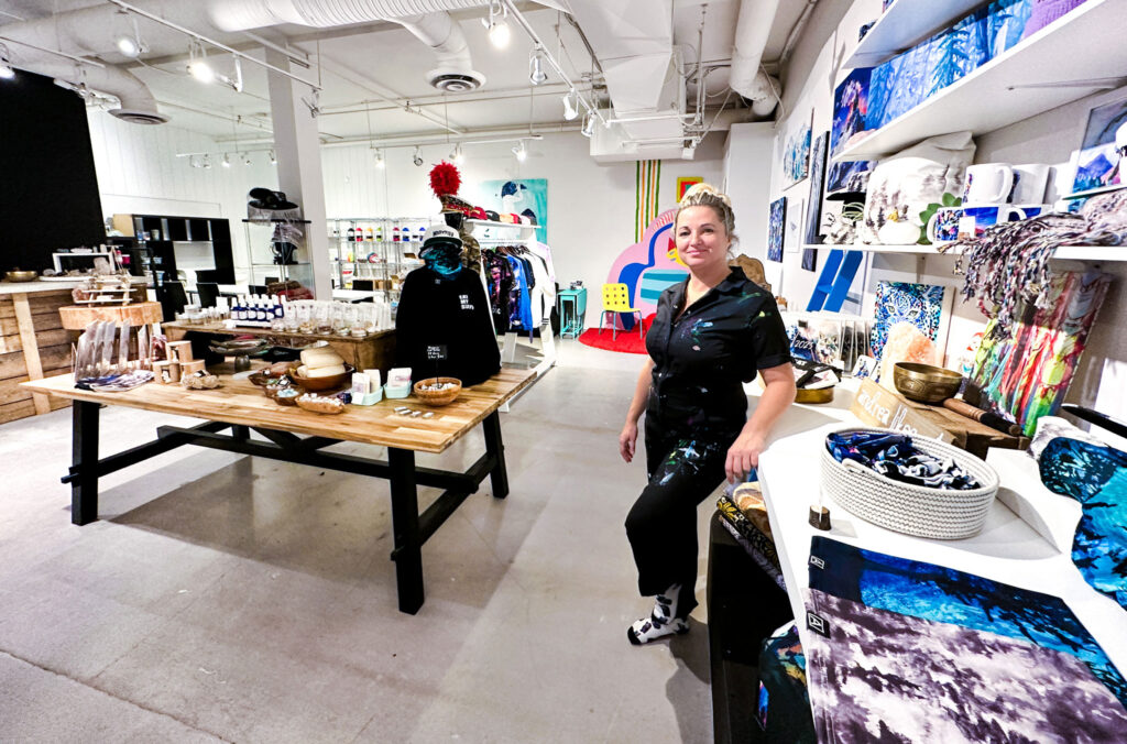 Whistler artist, Andrea Mueller stands in her new, shop in Creekside called ART POP.