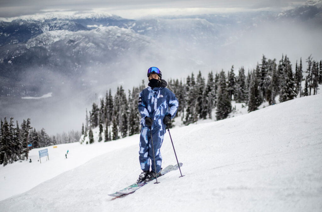Ski athlete, Tonje Kvivik smiles at the camera in her ski gear on Whistler Blackcomb.