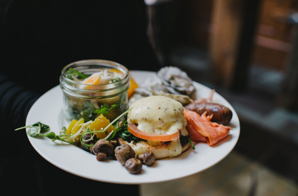 A brunch plate stacked with healthy breakfast items that all look delicious.