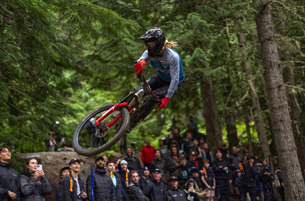 A rider gets great air off a jump during the Air DH event at Crankworx Whistler.