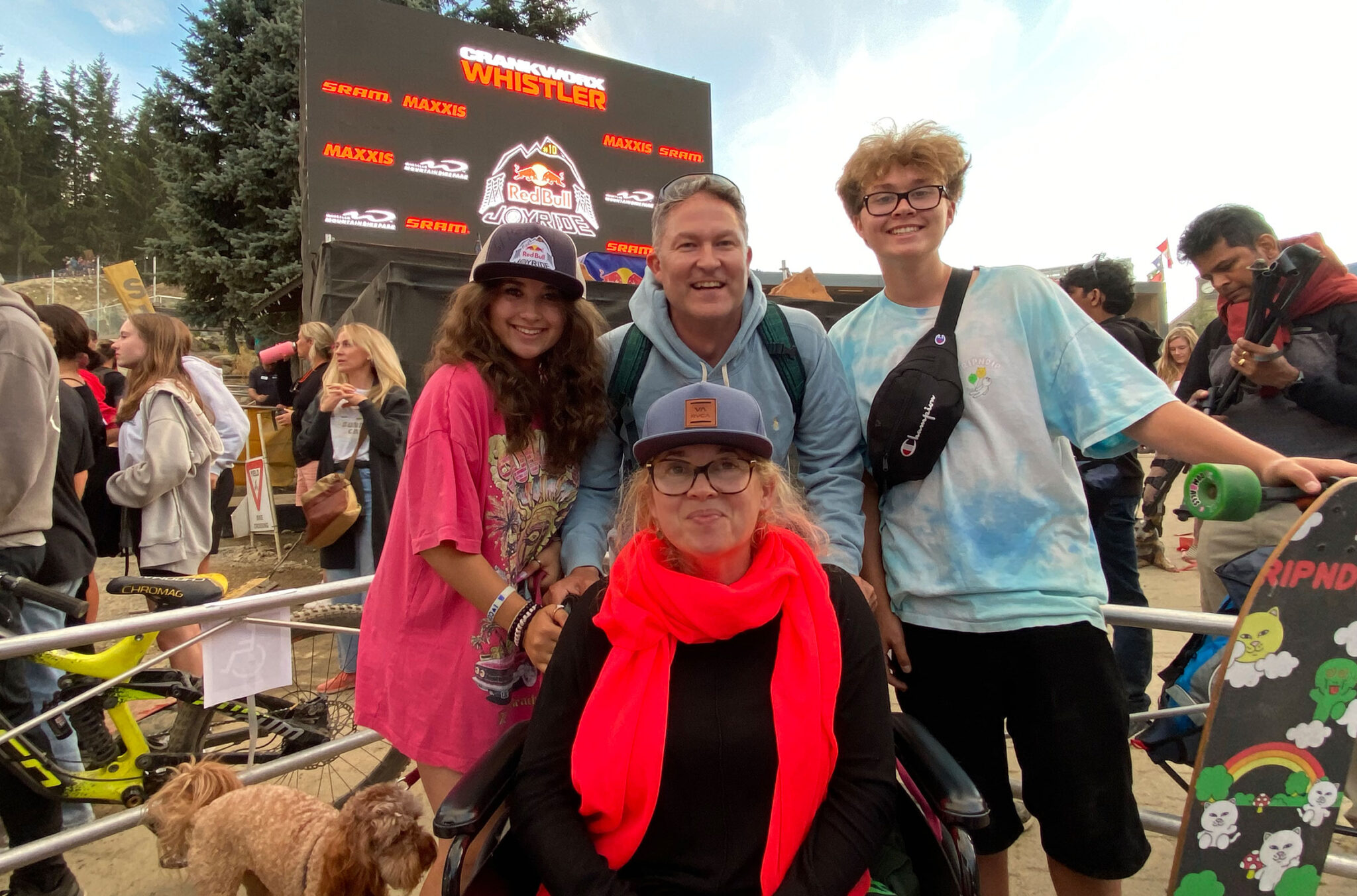 Miguel and his family pose for the camera in the accessible area to watch Red Bull Joyride, part of Crankworx Whistler.