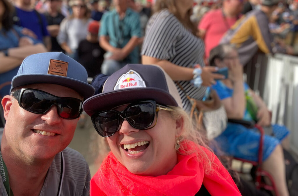 Miguel and Ineke smile as they watch the Red Bull Joyride event at Crankworx Whistler.
