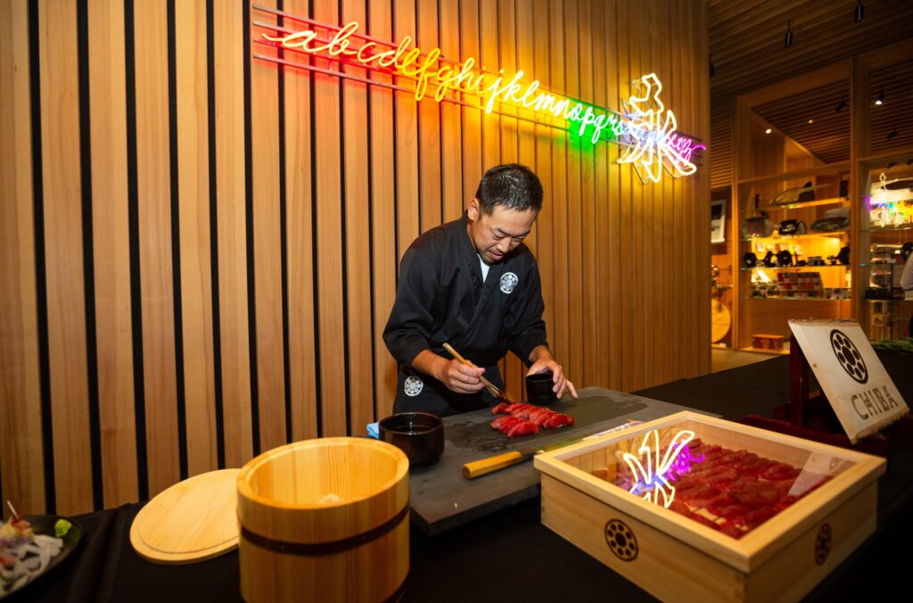 Chef Koji Shiba preparing sushi