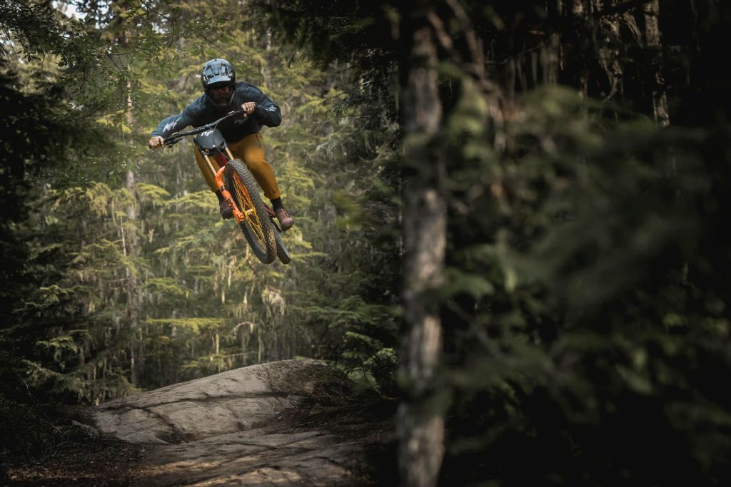 A rider gets big air off a jump in the Whistler Mountain Bike Park.