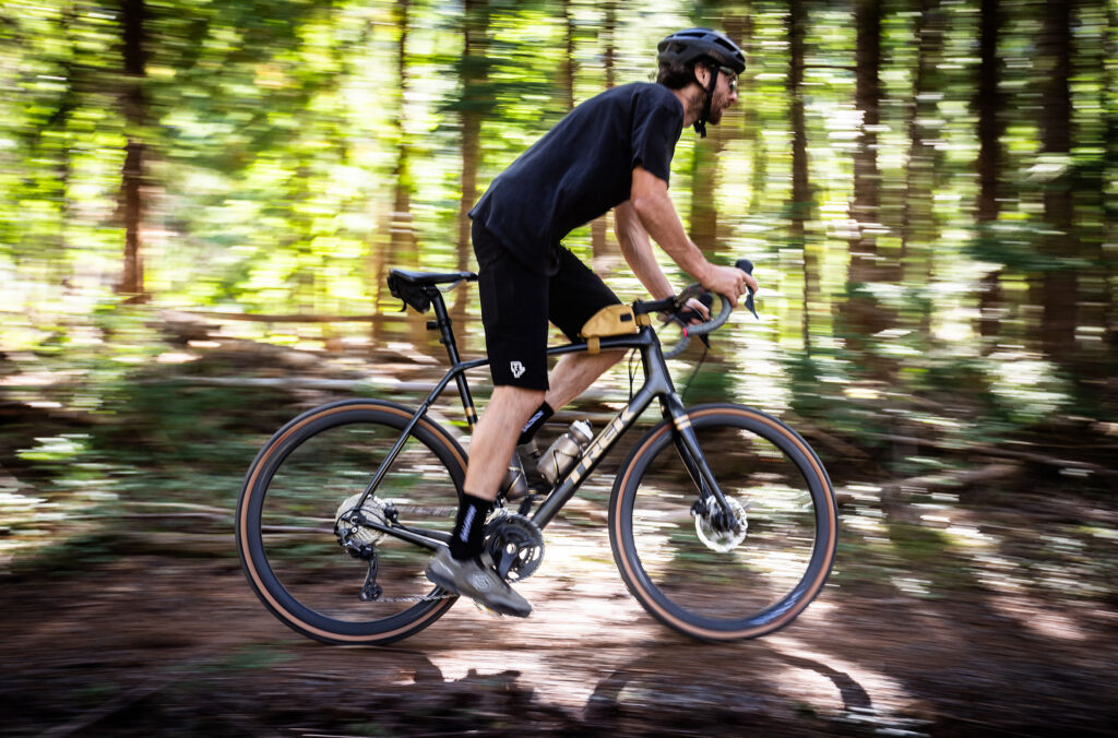 A cyclist rides a gravel bike along the Sea to Sky Trail in Whistler.