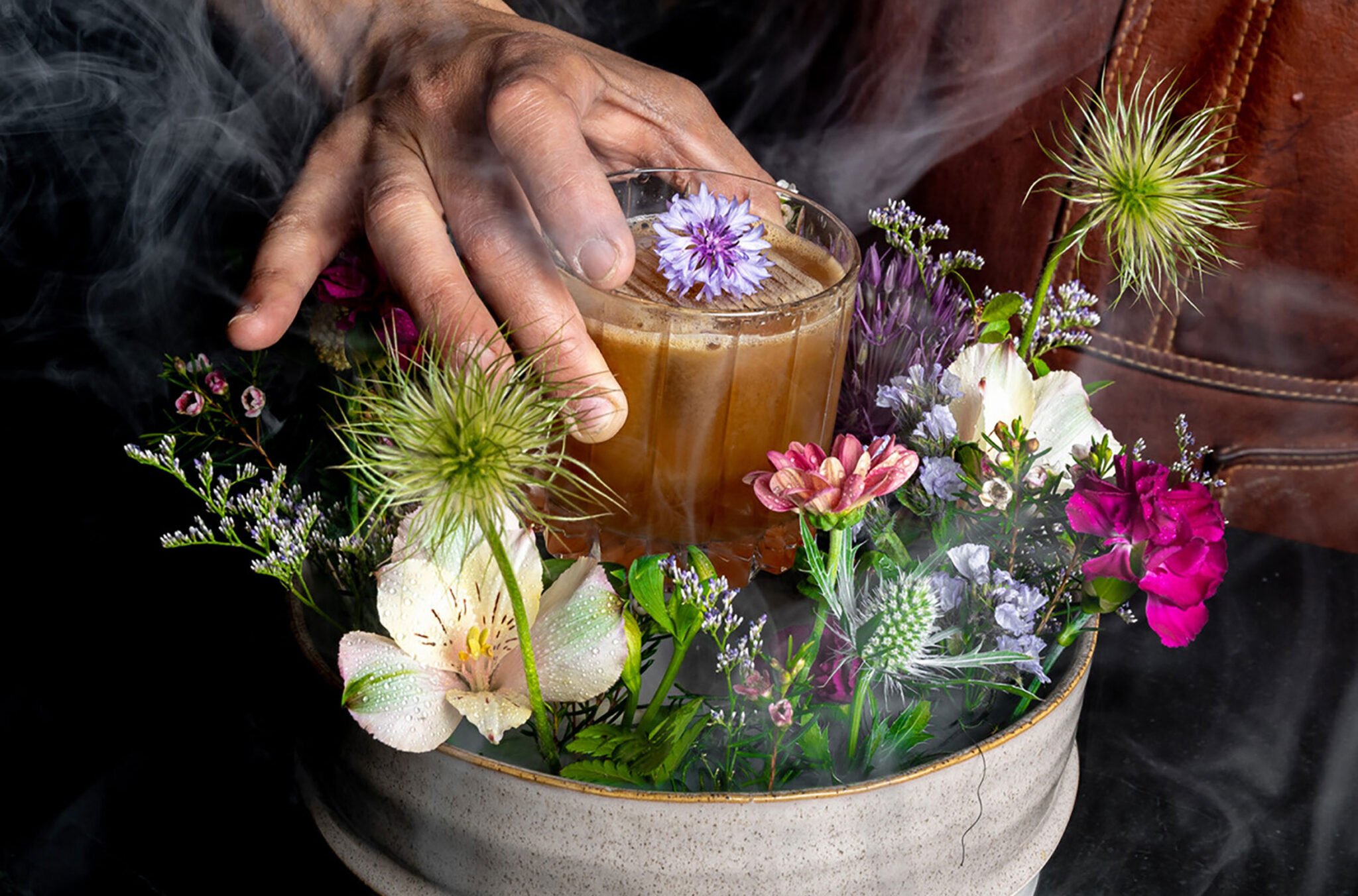 The Bruce's Garden cocktail at the Four Seasons's Braidwood Tavern comes surrounded by flowers.