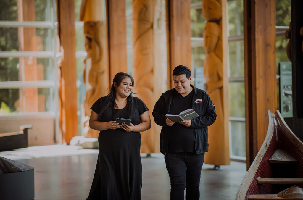 Georgina Dan, Cultural Administrator, and Moody Dan, Manager of Operations walk through the main gallery of the SLCC.