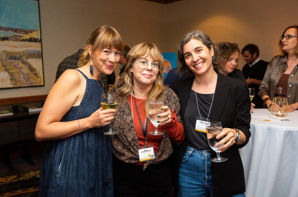 Three thriller authors pose for the camera at the 2023 Whistler Writers Festival.