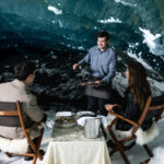A couple enjoy a unique dining experience in an ice cave close to Whistler.