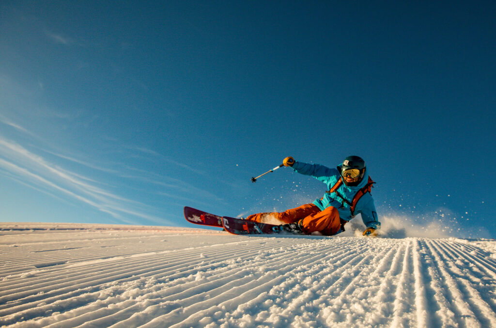 A skier enjoys the fresh corduroy on the slopes of Whistler Blackcomb.