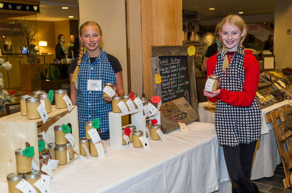 Two young entrepreneurs sell nut butters at Bratz Biz in Whistler.
