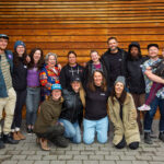 A group photo of the Zero Ceiling team taken at the Squamish Lil'wat Cultural Centre in Whistler.