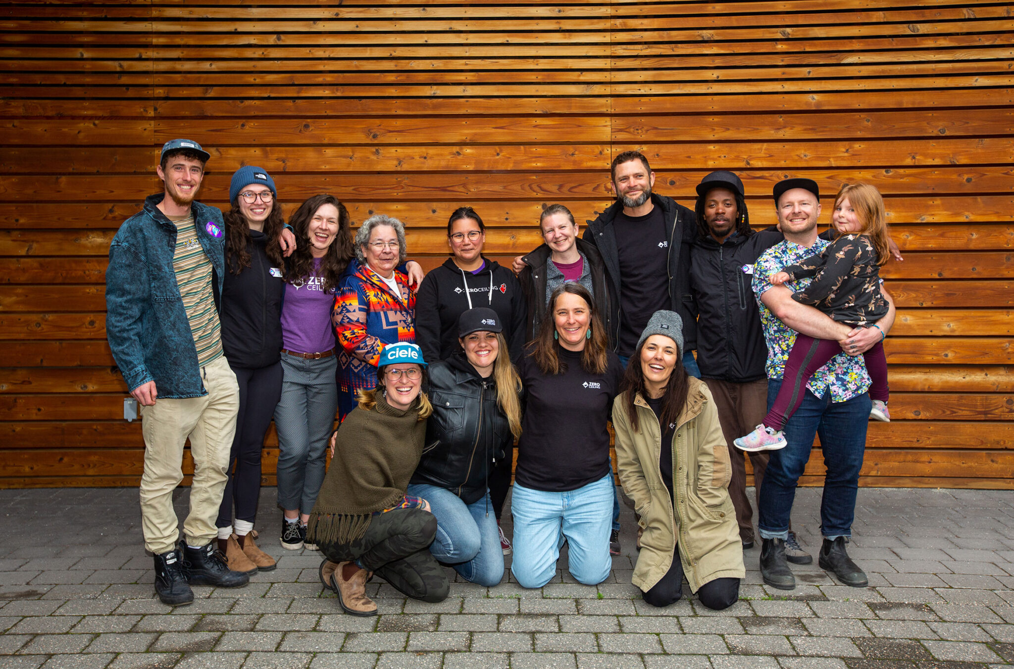 A group photo of the Zero Ceiling team taken at the Squamish Lil'wat Cultural Centre in Whistler.
