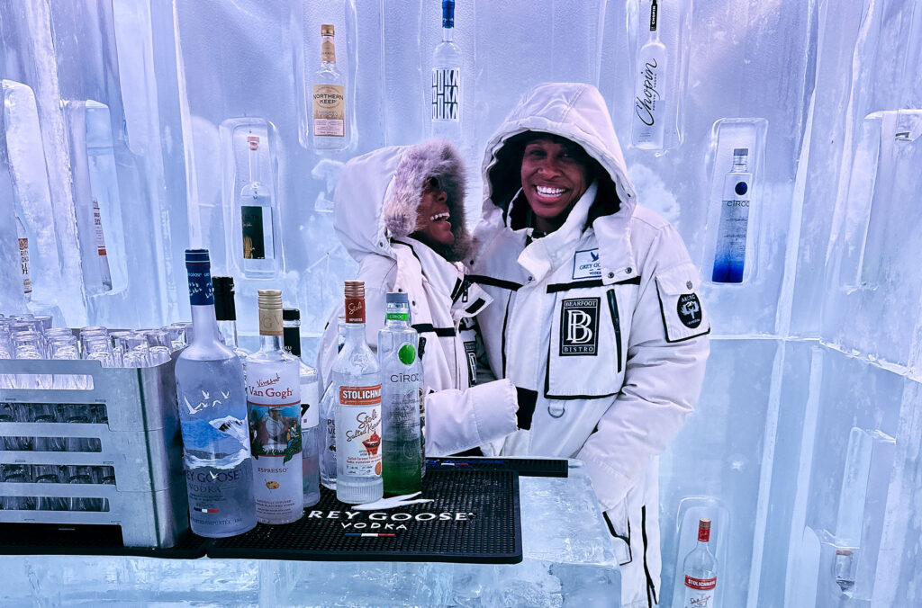 A couple enjoy the Bearfoot Bistro's vodka ice room in Whistler.