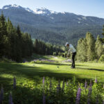 A golfer tackles the Fairmont Chateau Golf Club course in Whistler.