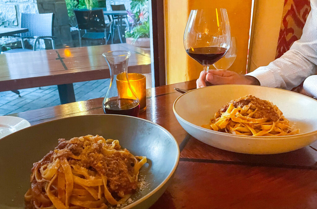 Two large bowls of Quattro's Bolognese tagliatelle.