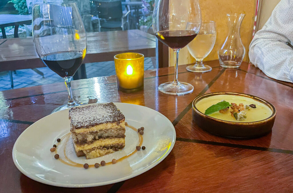 A shot of the desserts at Quattro, tiramisu on the left and a panna cotta on the right.