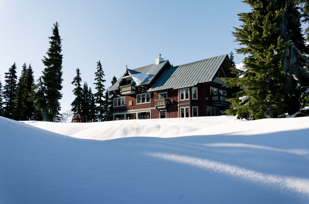 The Journeyman Lodge sits in the snow in its backcountry locale in the Callaghan Valley, Whistler.