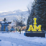 The yellow and black I AM emblem at the entrance to Whistler, signifying the Invictus Games Vancouver Whistler 2025.