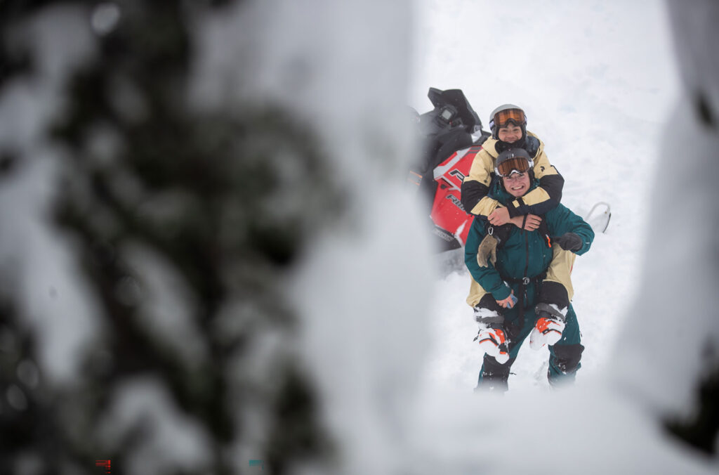 Skiers WeiTien Ho and Marcus Groguen play around in the snow on a film shoot.