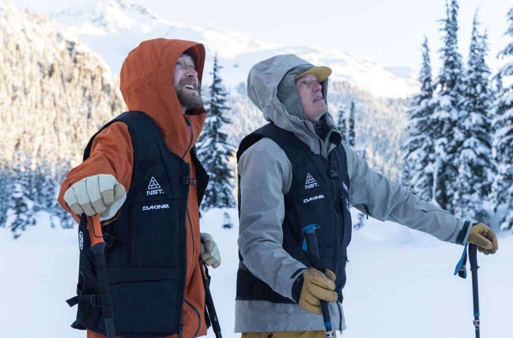 Pro snowboarders Brin Alexander and Bjorn Leines look at the terrain in the Callaghan Valley picking the route for their competition in the Natural Selections Duels.