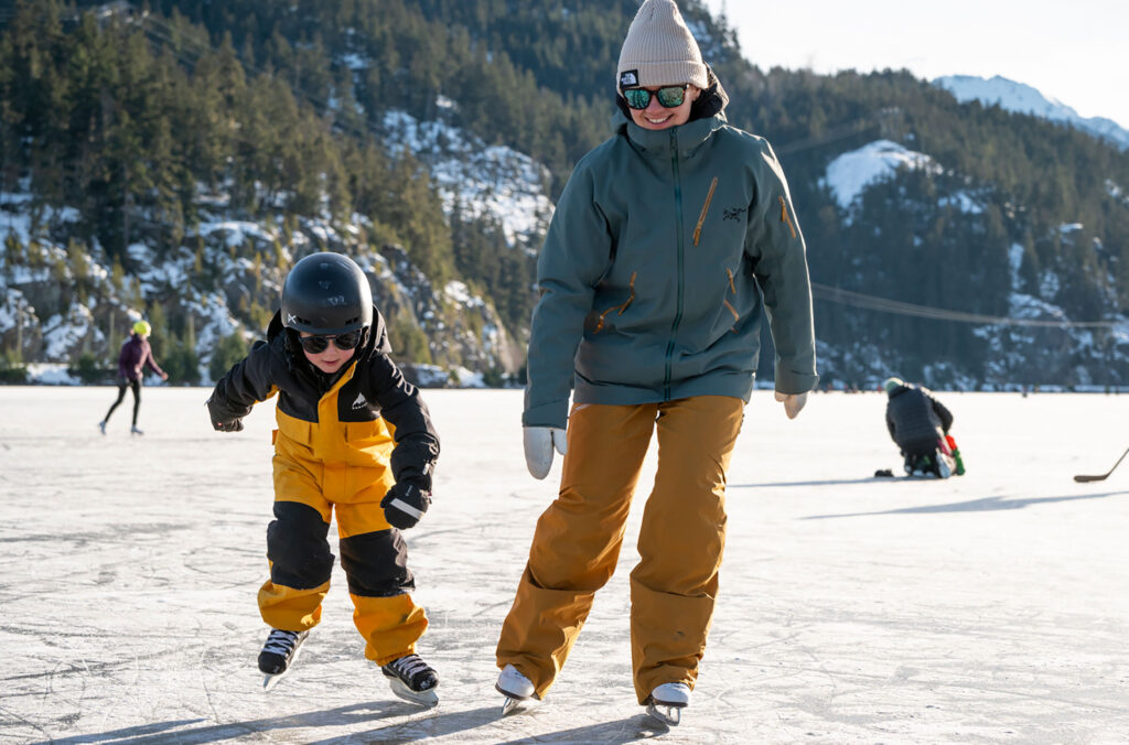 Sara and her son ice skate on a frozen lake in Whistler.