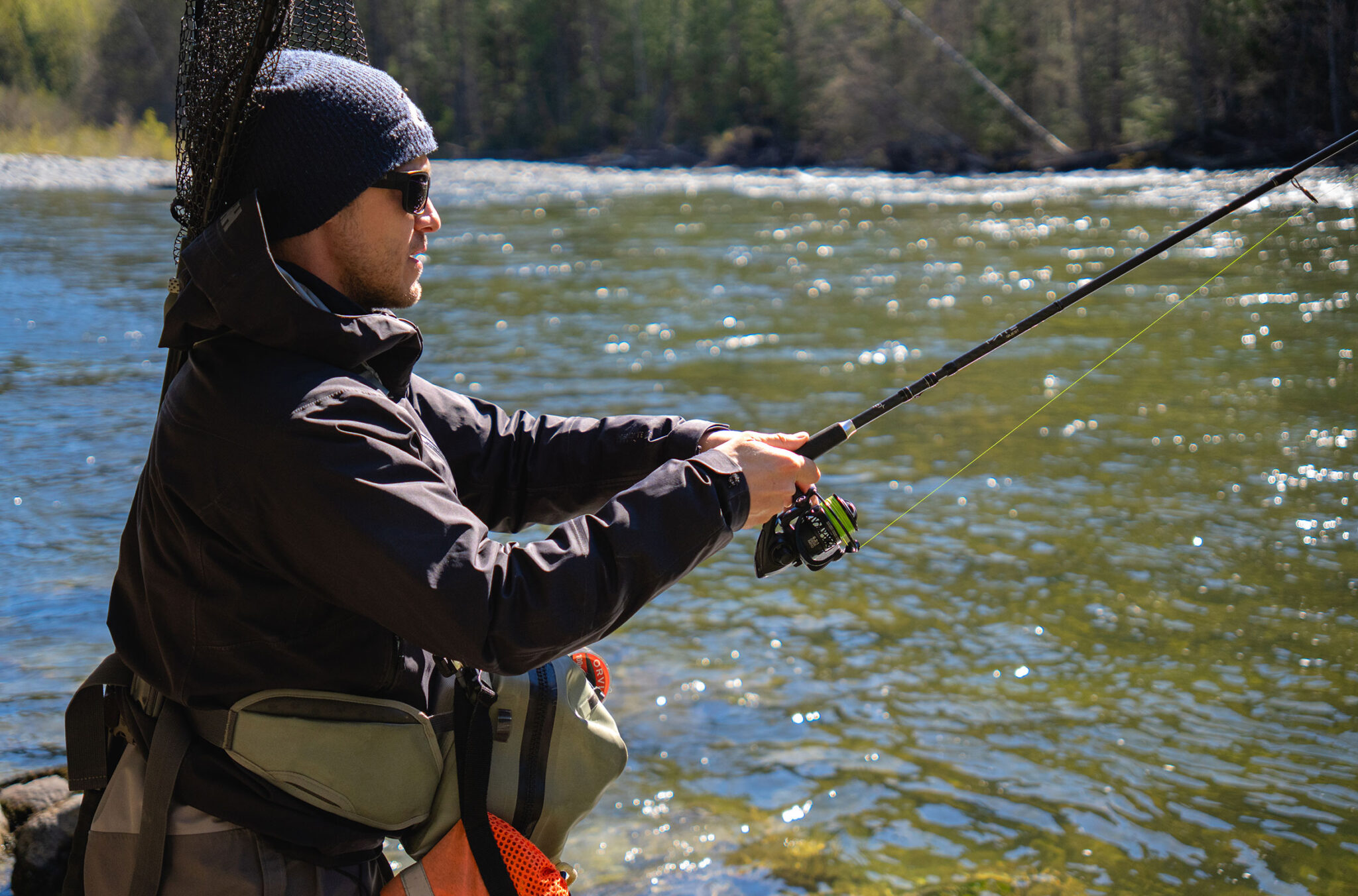 Matthew Prosdocimi, owner of Whistler Year-Round Fishing, fishing in the spring sunshine.