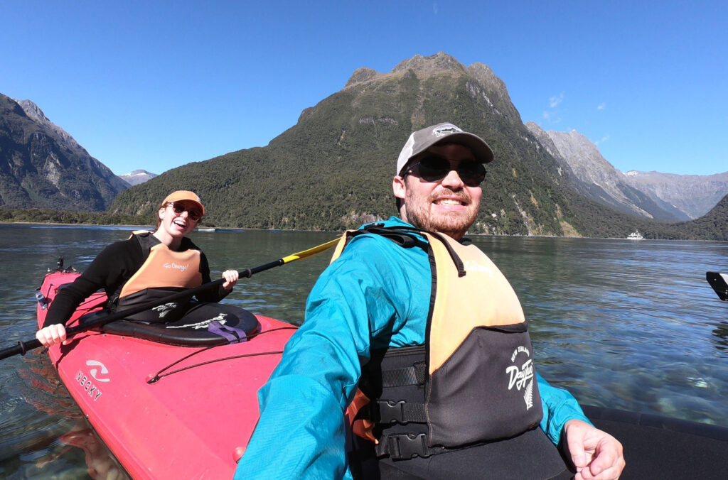 Sean Marihugh takes a selfie while sat in a double kayak.
