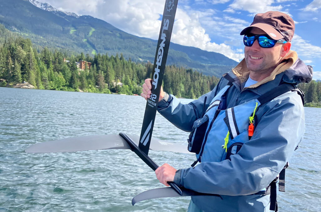 Francois Herbert, the general manager of Whistler Sailing, holds up the bottom wing of a wing foil that goes in the water.
