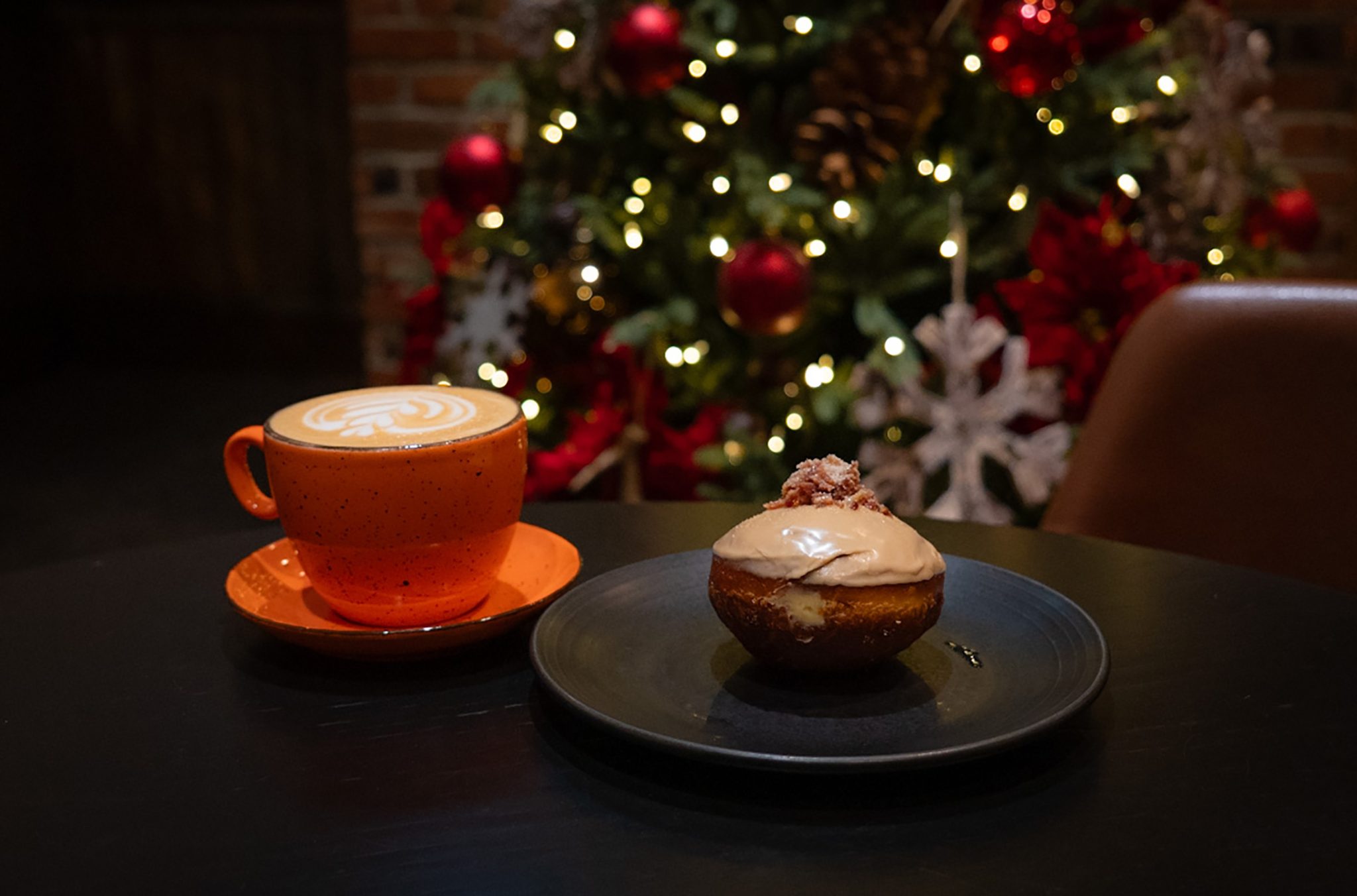 A coffee and a maple, bacon donut at Portobello in Whistler.
