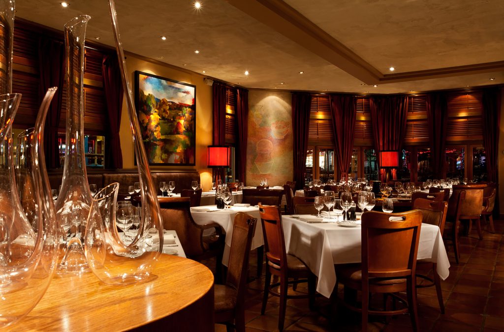 Araxi's warm and inviting dining room.
