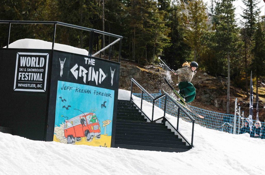 A skier rides down a rail during The Grind, a competition during the World Ski & Snowboard Festival in Whistler.